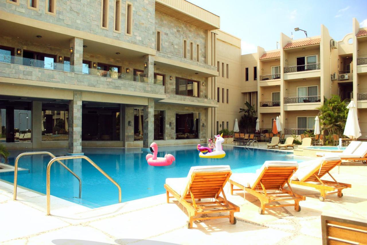 Panacea Suites Hotel Borg El Arab Exterior photo